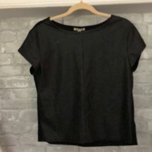 Women’s black faux leather front top